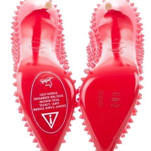 Neon pink christian louboutin spike pigalle